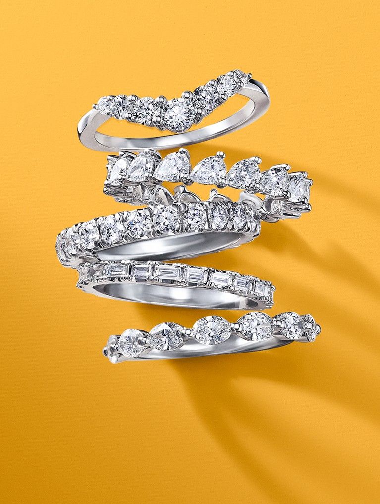 Assortment of stackable diamond wedding rings.